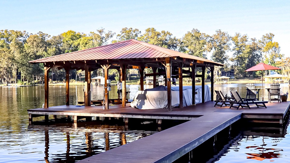 Cobb Cabin | Colorful lakefront home with private dock, scenic porch, washer/dryer, & AC