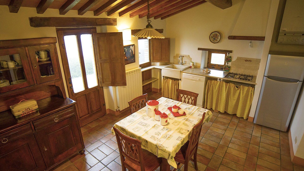 Radicofani Apartment | Comfortable apartment with garden in an old farmhouse with swimming pool