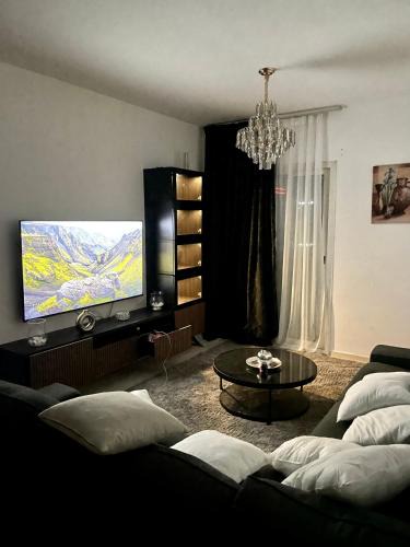 Al Nahda Apartment | Comfortable Apartment Bedroom And Spacious Living Room Family and Couple