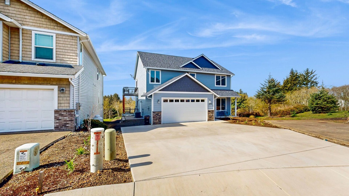 Netarts House | Comfortable home with ocean views, with private hot tub, deck, fireplace, WiFi