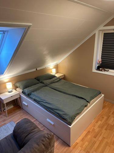 Osoyro House | Comfortable room - Double bed - Private bathroom - Free parking - Shared kitchen - Bus stop and store 2 min walk