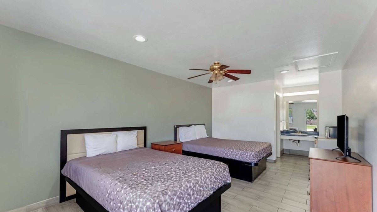 Eastside Promise Neighborhood Hotel | Comfortable Room w/Complimentary Breakfast - Perfect for a Restful Stay