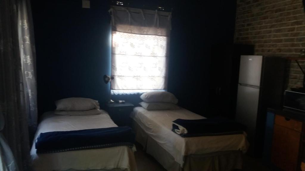 Lephalale House | Comfy room with dstv and aircon in convenient location