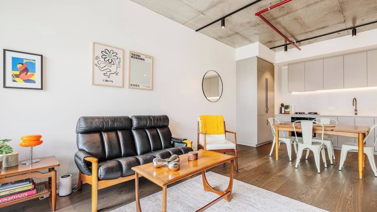 Brunswick Apartment | Concrete Junction Sunny Industrial Balcony Haven