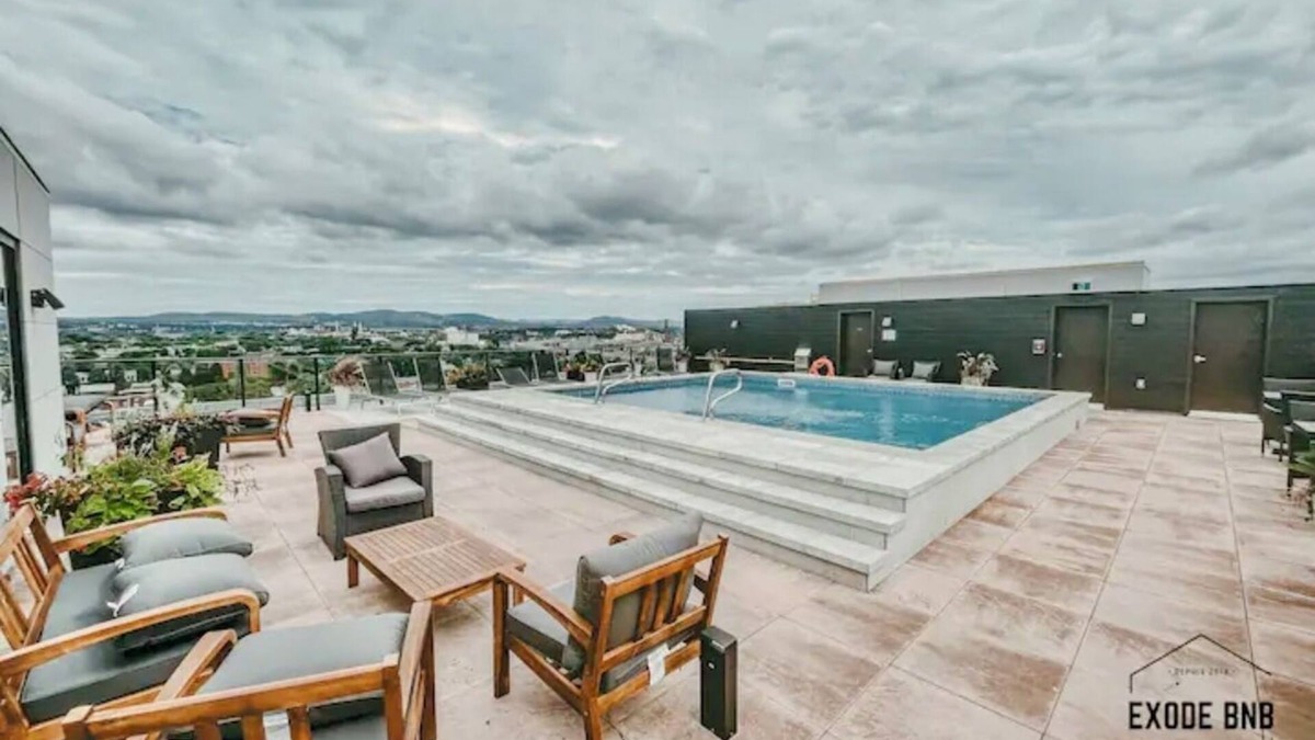 Saint-Roch Apartment | Condo - 305 | Swimming pool | Terrace with a view