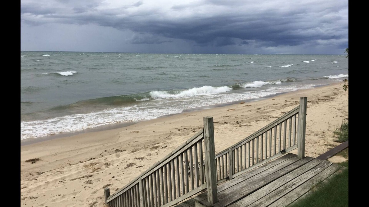 Port Austin Condo | Condo #5 Upper level condo with lovely Lake Huron sunset views .