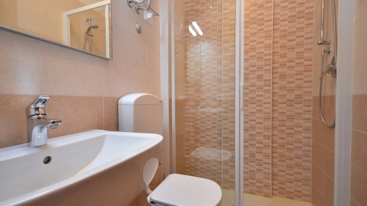 Lignano Riviera Apartment | Contemporary holiday apartment with shared swimming pool