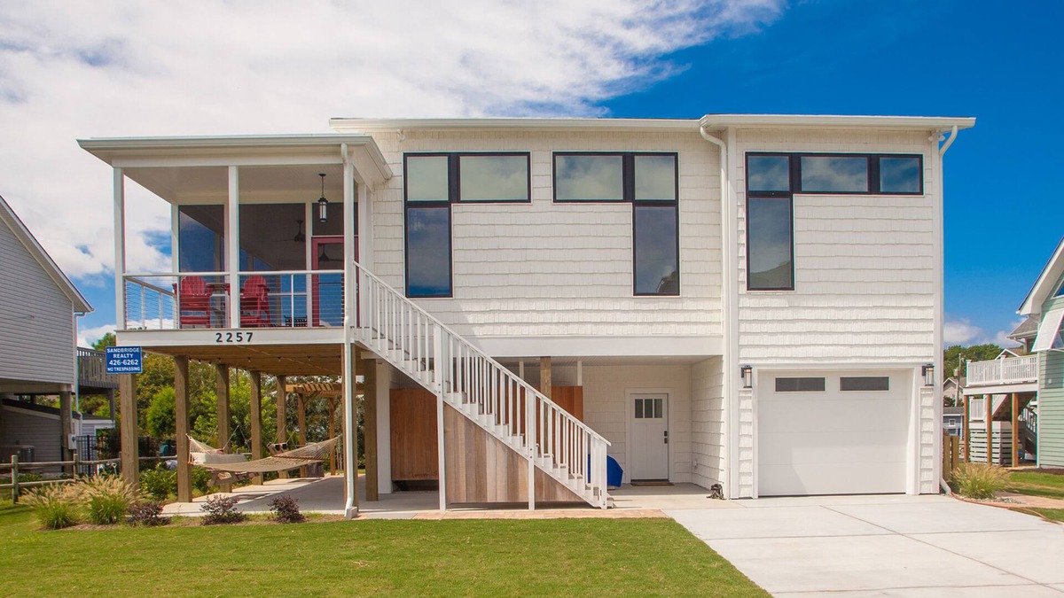 Sandbridge House | Contemporary home on canal w/elevator, dock, private washer/dryer, central AC