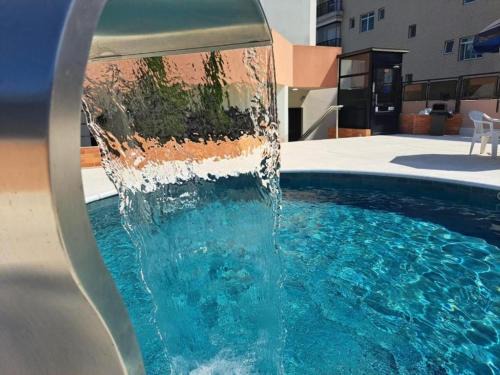Gonzaga Apartment | Cosmopolitan Praia Flat