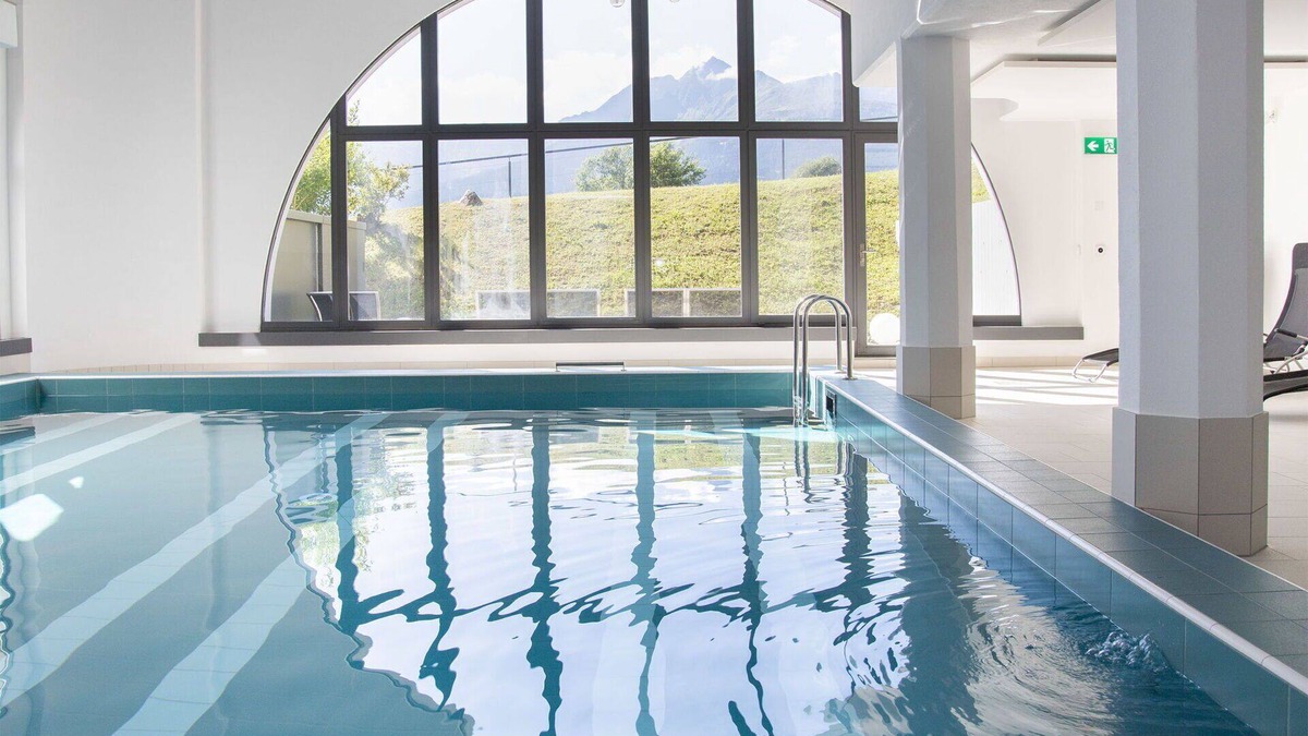 Falera Apartment | Cosy apartment for 4 people with WIFI, pool, TV, balcony, panoramic view and parking