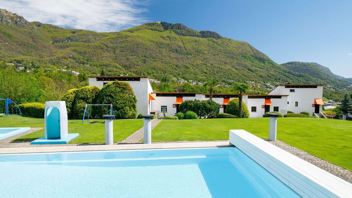 Capriasca Apartment | Cosy apartment for 5 guests with WIFI, pool, TV, patio, pets allowed and panoramic view