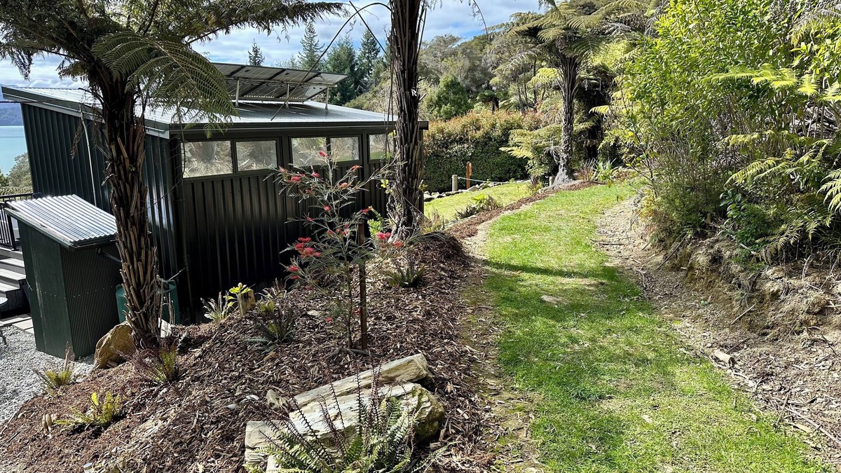 Moetapu Bay Cabin | Cosy modern two bedroom off-grid cabin, in the Marlborough Sounds