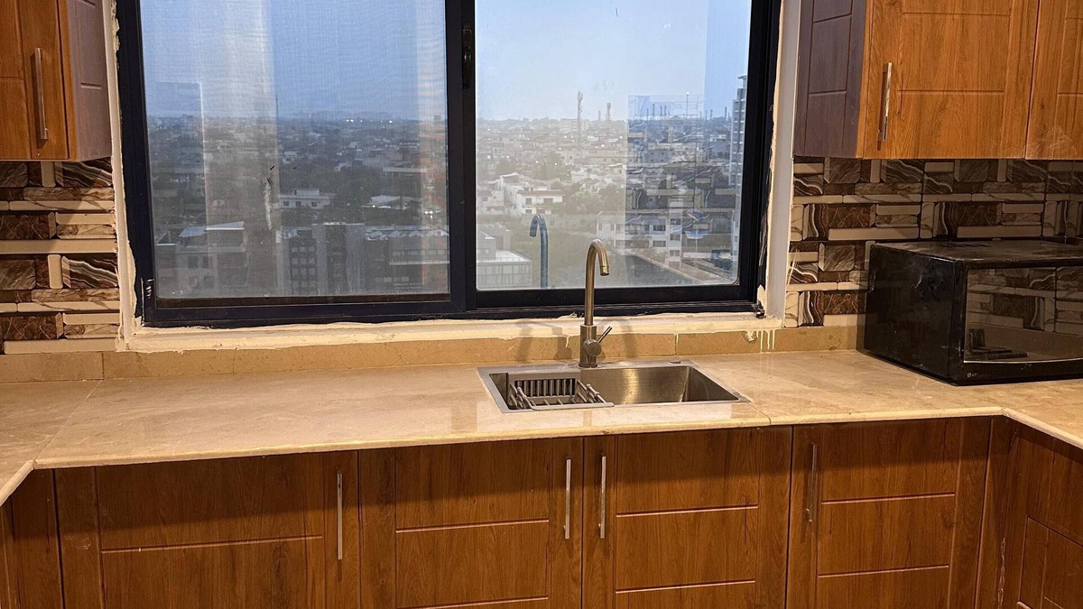 Rawalpindi Apartment | Cosy Sky-High Retreat: Ultimate Cityscape from the Top Floor