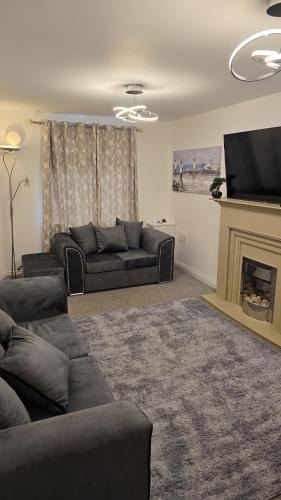 Bolton Apartment | Cosy three bedroom spacious house with parking and Wi-Fi for 7guests