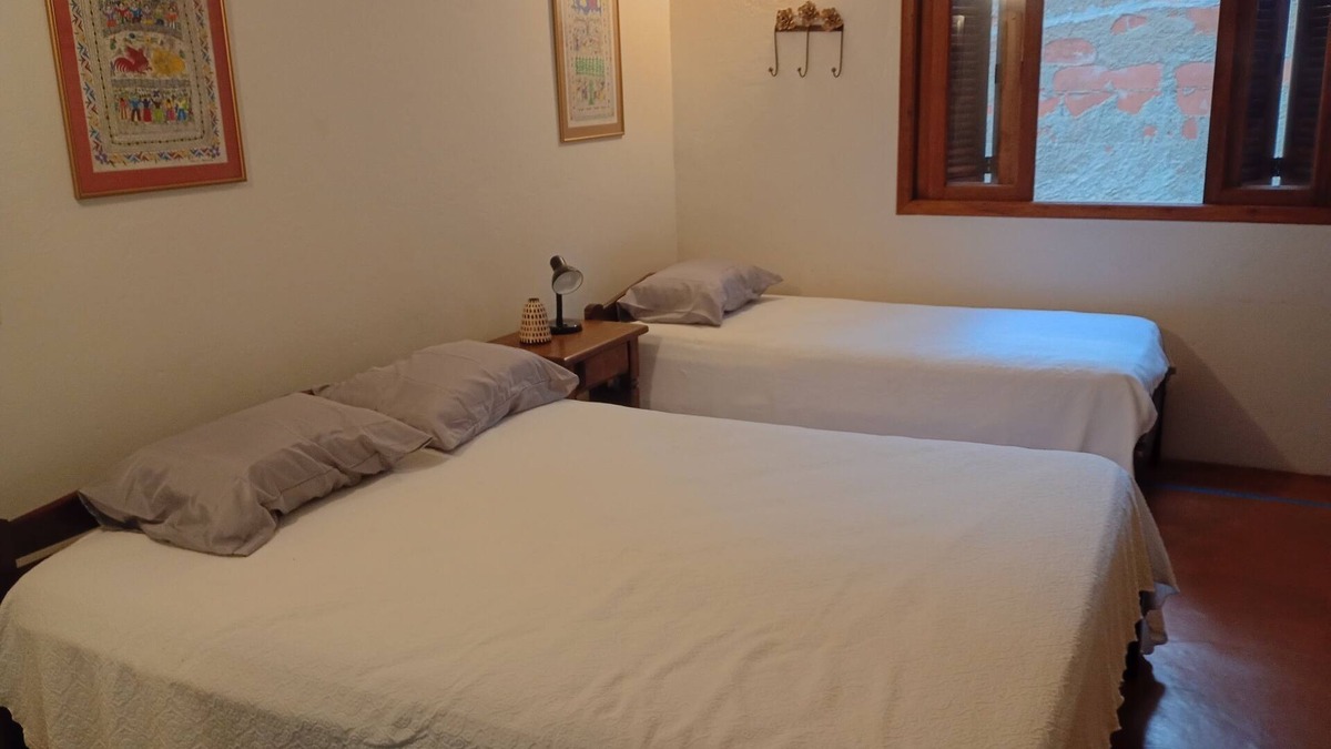 Praia da Fortaleza Apartment | Couples' suite with your feet in the sand at Praia da Fortaleza