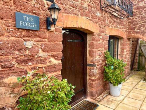 Liverton House | Countryside converted barn with hot tub and one parking space