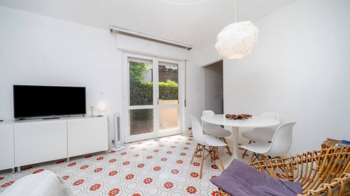 Grado Pineta Apartment | Cozy 56 sqm ground-floor apartment featuring a balcony running along the entire perimeter and a private garden, perfect for relaxation and tranquility. Located in Grado Pineta, a green and quiet area just steps from the sea and nature trails, it offers t