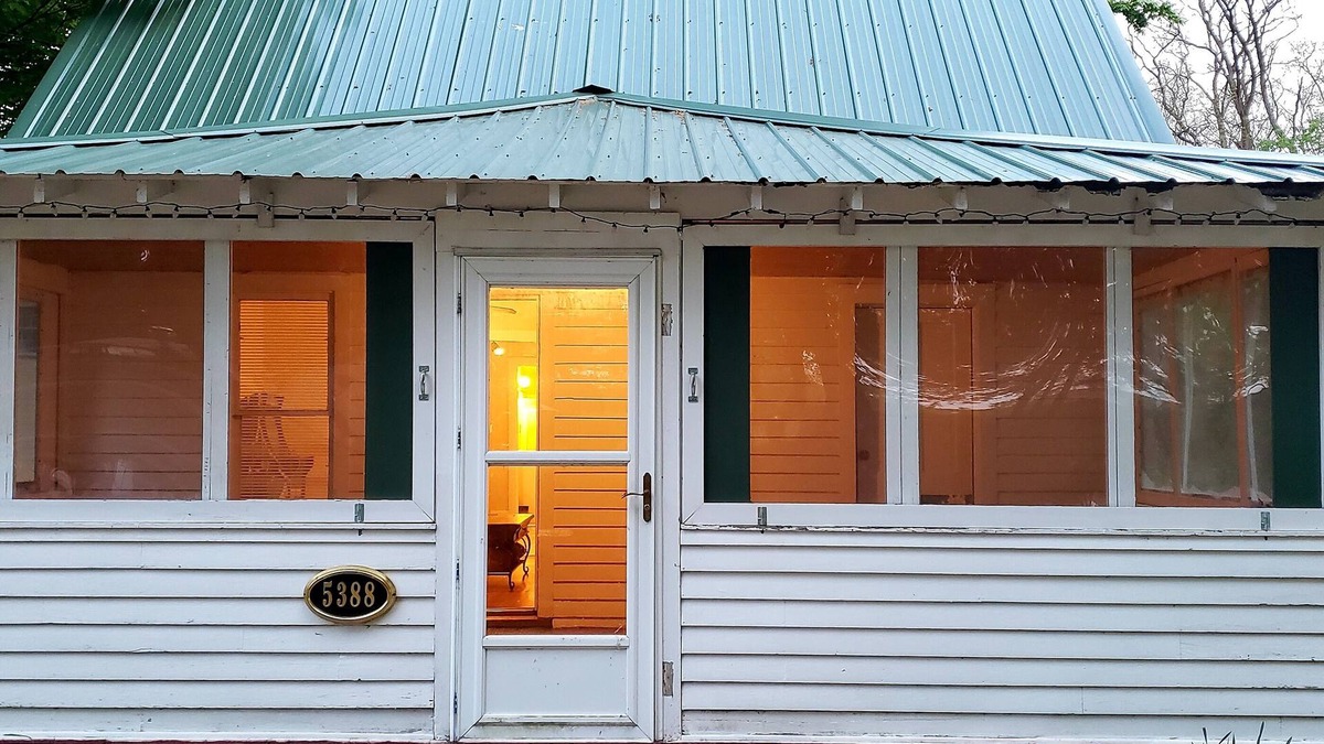 Whitehall Cabin | Cozy cabin with WiFi, hot tub, lake access, and AC in charming Whitehall.
