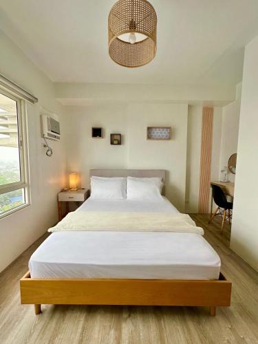 Bantud Hacienda Apartment | Cozy Condo bedroom in Bacolod City