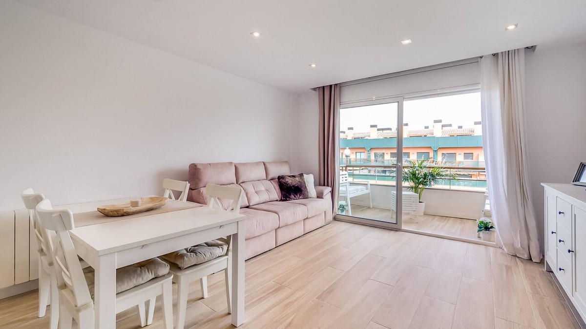 Palafolls Apartment | Cozy duplex for 4 people, free wifi and air conditioning next to the bedrooms. Vivalidays Elisabet community pool and garden