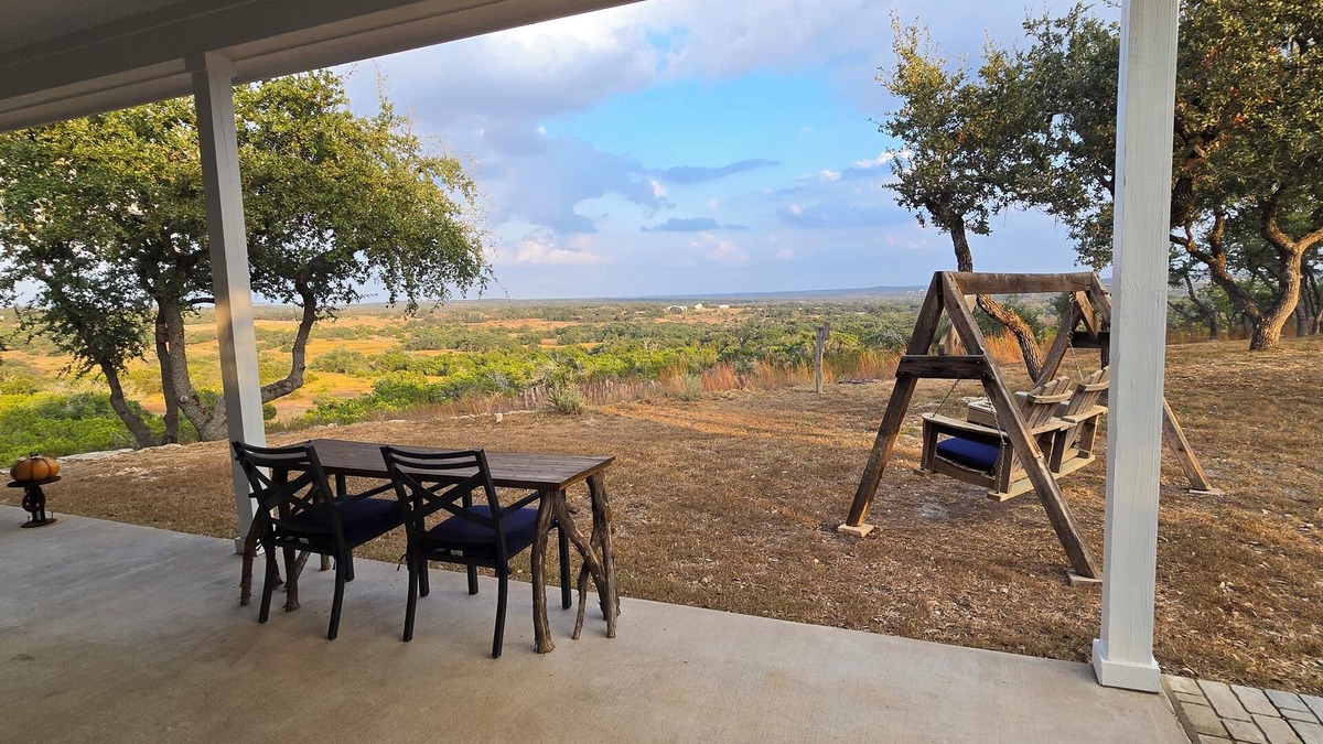 Dripping Springs Cottage | Cozy hilltop guesthouse at Barkspin Oaks Ranch. Beautiful views!
