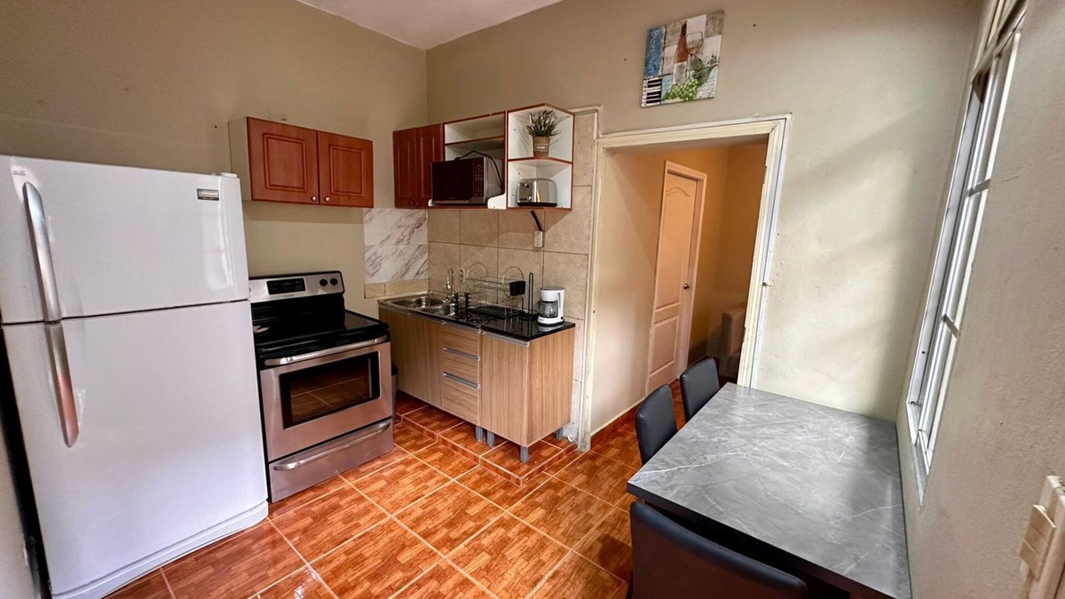 Sector 1 Nor-Oeste Apartment | Cozy San Pedro Sula apartment with WiFi, AC, full kitchen, and comfy living room