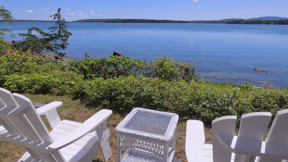 Trenton Cottage | Cozy waterfront getaway for two with views of the ocean and mountains in Acadia!