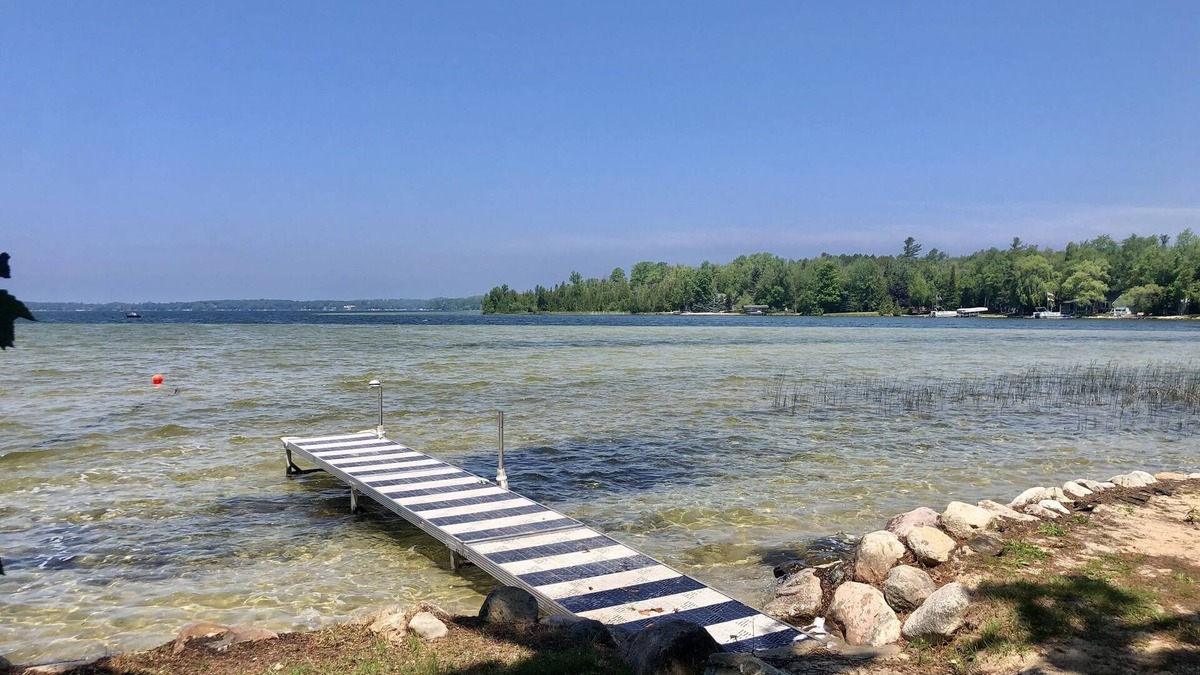 Lake Leelanau Cabin | Cozy waterfront sunset cottage on Lake Leelanau. Air, Near Leland.