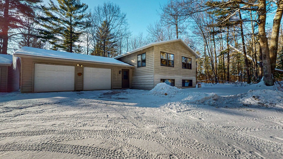 Manitowish Waters House | Cozy wooded home w/access to snowmobile trail, near town, lakes, & bike trails