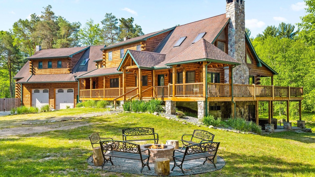 Gouldsboro House | Creekfront Log Mansion With Heated Outdoor Pool and Hot Tub