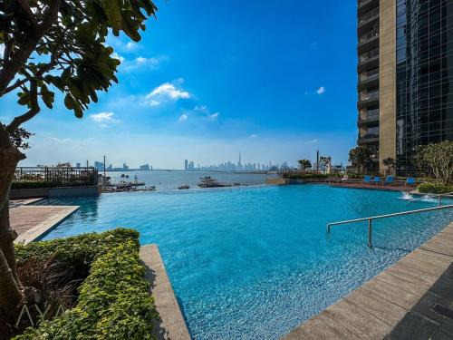 Dubai Apartment | Creekside Vibes Chic Stay with City Views By ĀYA Boutique