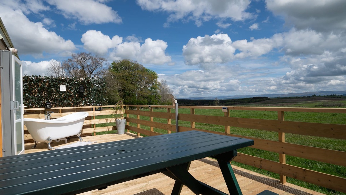 Penrith Cabin | Cross Fell - Stunning views and an outdoor bath tub on the decking!