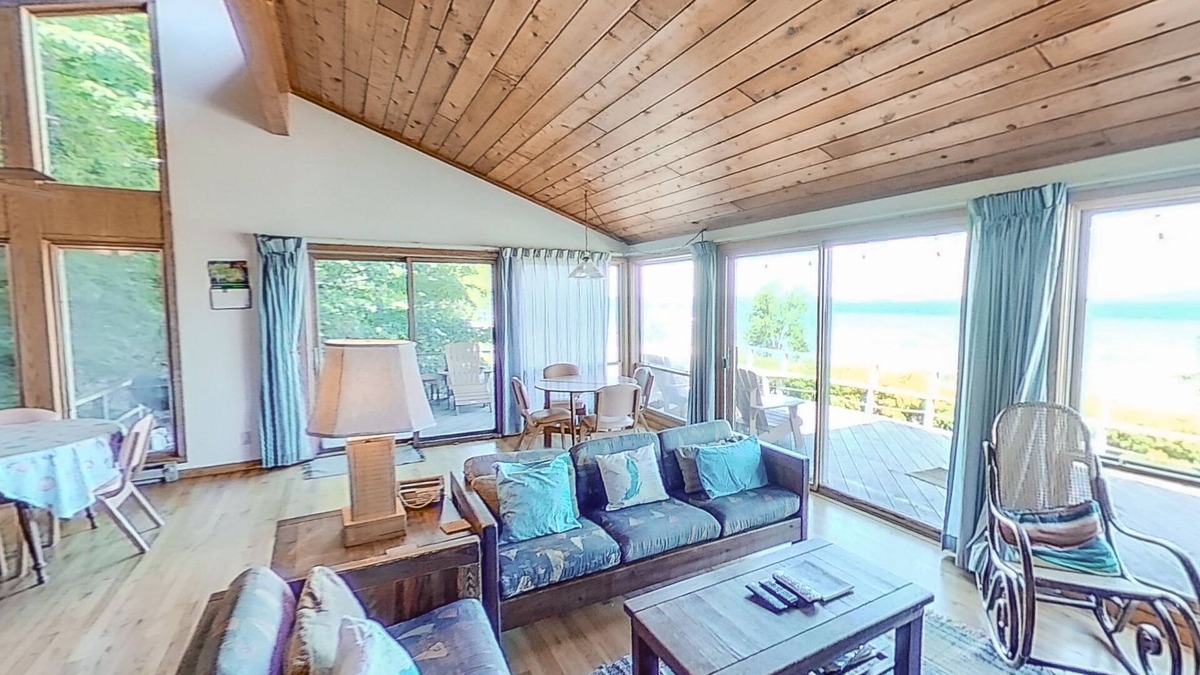 Frankfort Cabin | Crystal Lake retreat w/terrific lake views, private waterfront, firepit, 2 bikes