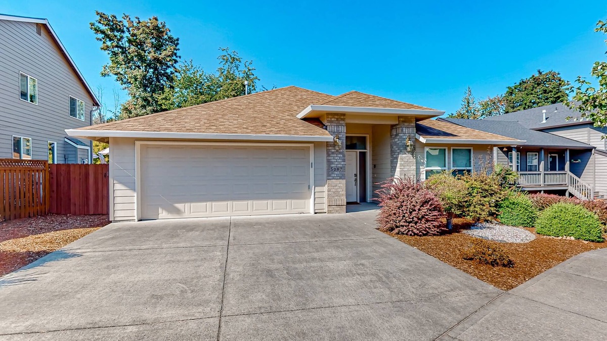 Gresham House | Custom-built home alongside greenspace with deck & massage chairs
