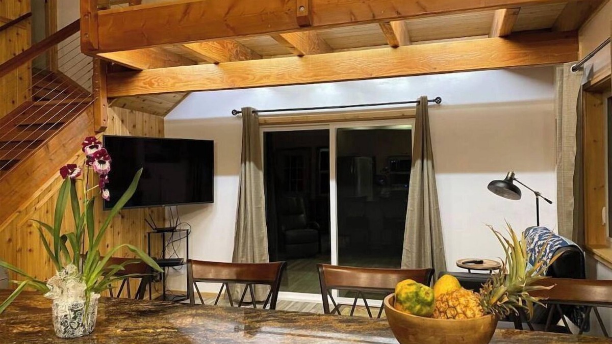 Honokaa Cottage | Custom cottage feels bright & airy yet cozy and private in this country setting.