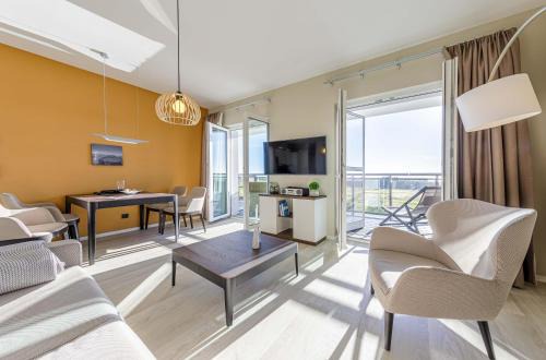Ostseebad Wustrow Apartment | Dünenlounge - 5 Sterne Ferienwohnung mit West-Balkon und fantastischem Blick über den Deich