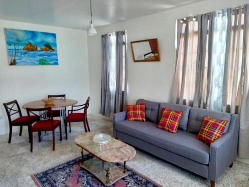 Calibishie House | Dado's Place - 2 bedroom house with AC and verandah