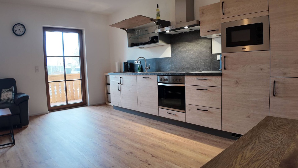 Prien am Chiemsee Apartment | Day courtyard new build apartment