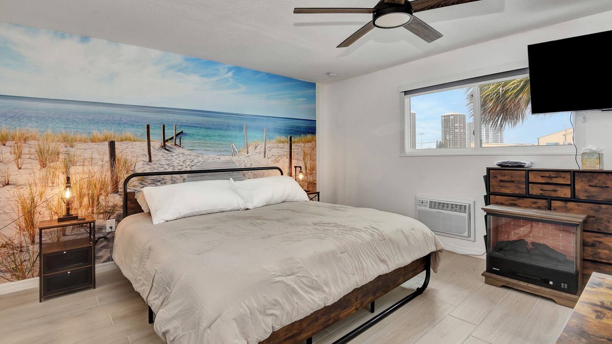 Daytona Beach Shores Hotel | Daytona FL Studio suite King bed kitchen walk in shower #11