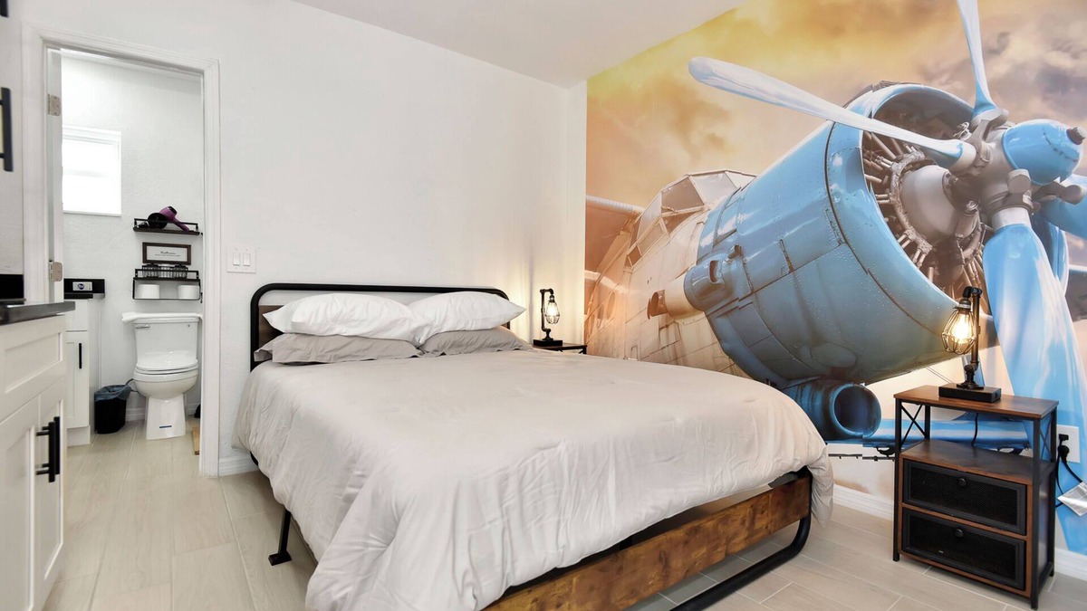 Daytona Beach Shores Hotel | Daytona Studio suite Queen bed kitchen walk in shower #3