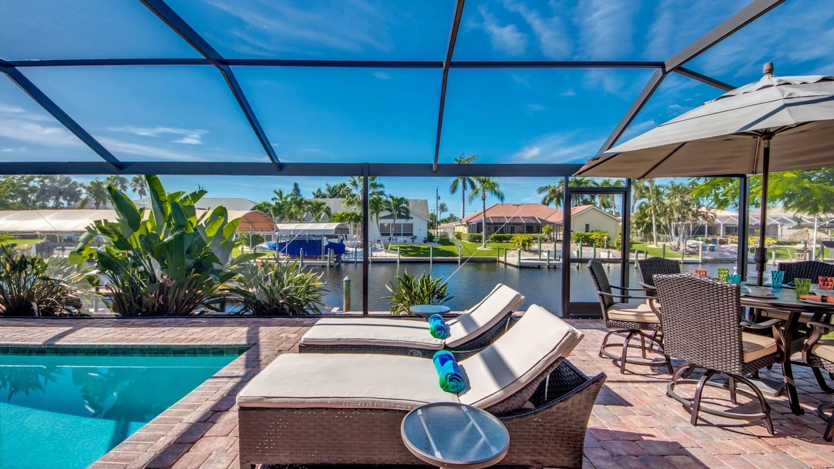 Pelican Villa | Delightful 3 BR waterfront Villa w. heated pool/dock/boat lift/fishing poles