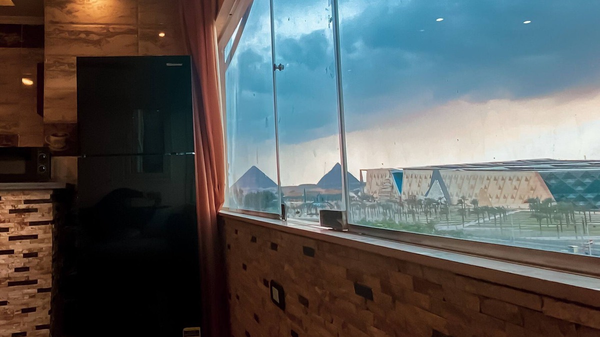 6th of October City House | Deluxe apartment in a building with an elevator with amazing Pyramids view