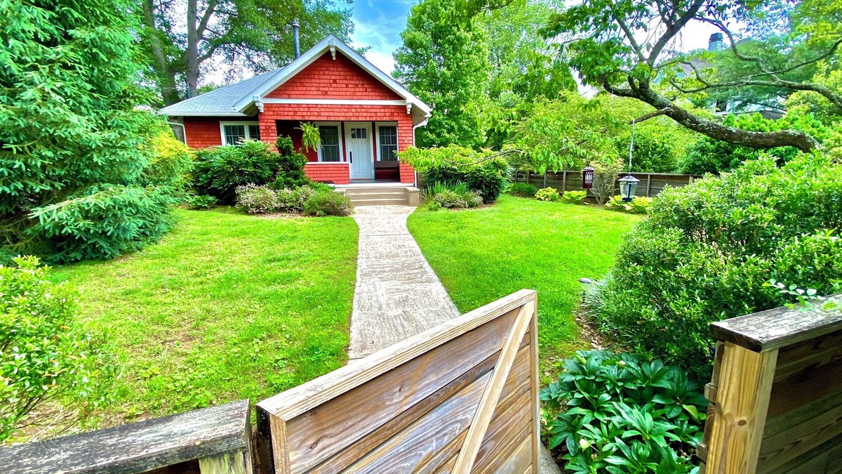 Brevard House | Deluxe Downtown Bungalow - fenced in yard, pet friendly.