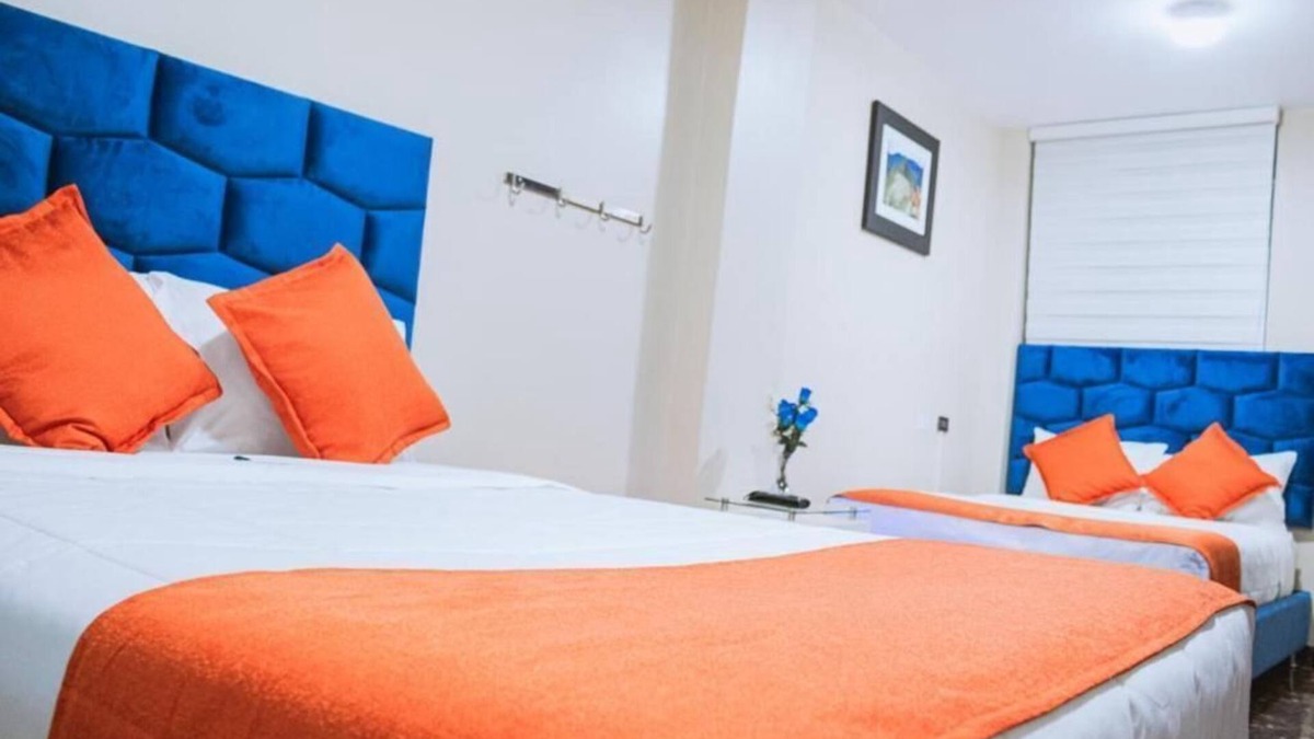 Santiago de Surco Apartment | Deluxe Queen Room with Two Queen Beds 4