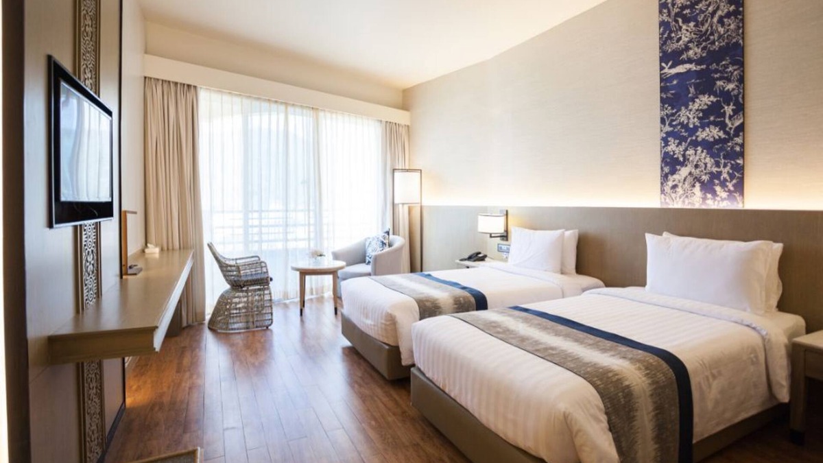 Patong Hotel | Deluxe room # 15, partial sea view