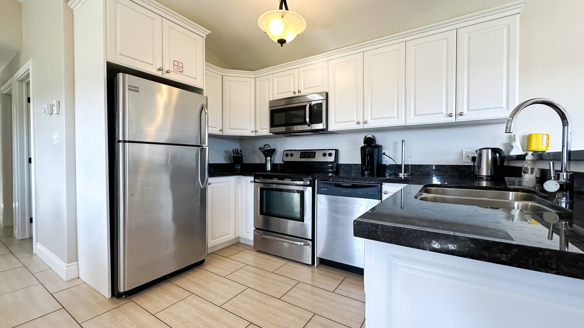 Stanley Bridge Condo | Deluxe two bedroom condo with outdoor fireplace