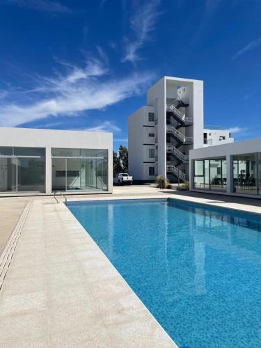 Puerto Madryn Apartment | Departamento Nuevo- Piscina Techada- Climatizada - Confort y Calidad a metros del mar