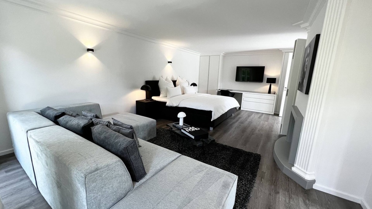 Rottau Apartment | Design studio with pool and sauna