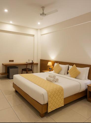 Edappal Hotel | Devalokam Grand