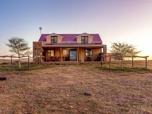Overberg District Municipality House | Die Rooidakhuis